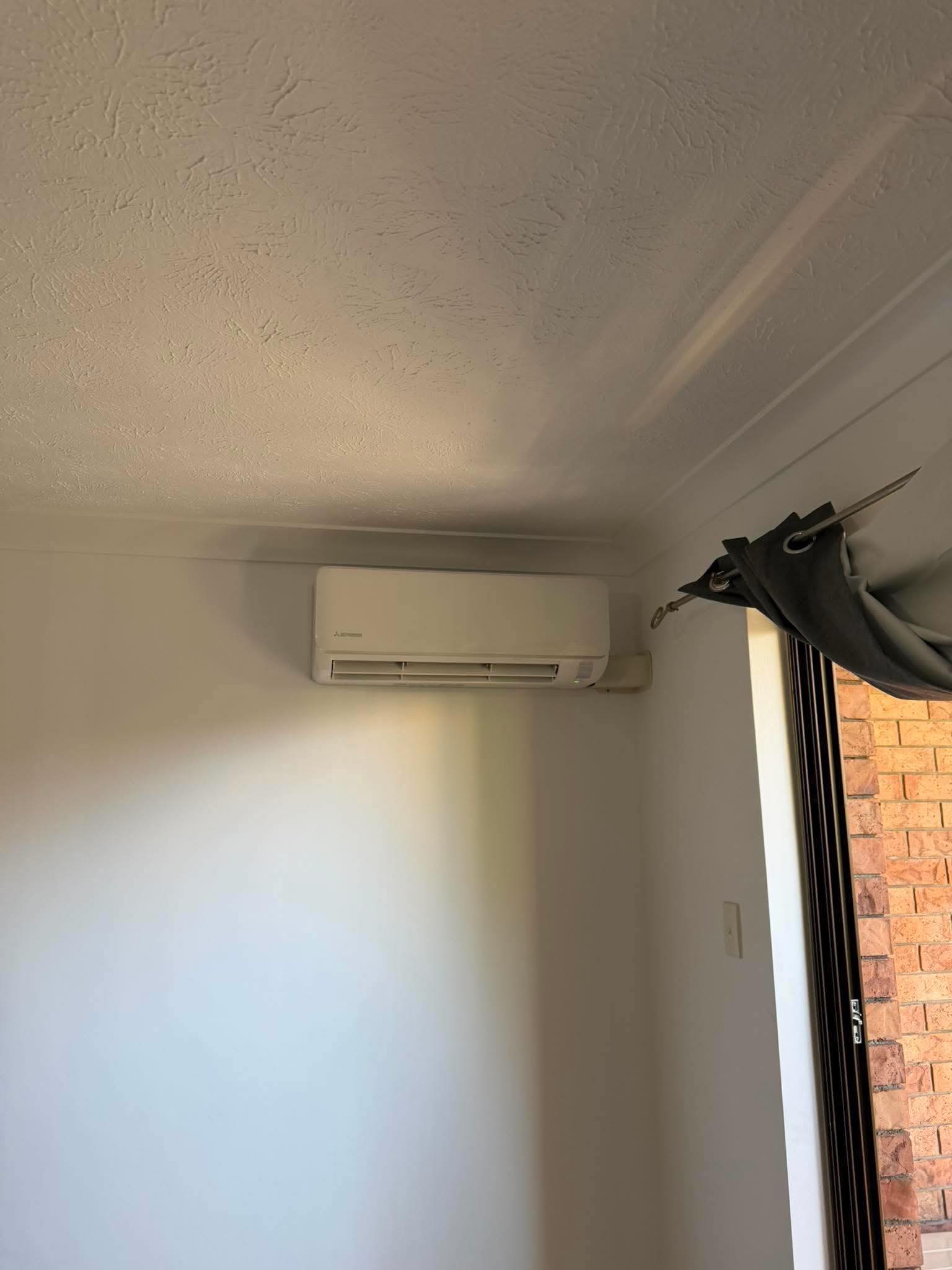 Side exit with spacing off the wall as per customer request. Can’t beat an MHI split!