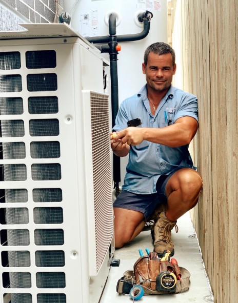 Brad working on a ducted air conditioning unit