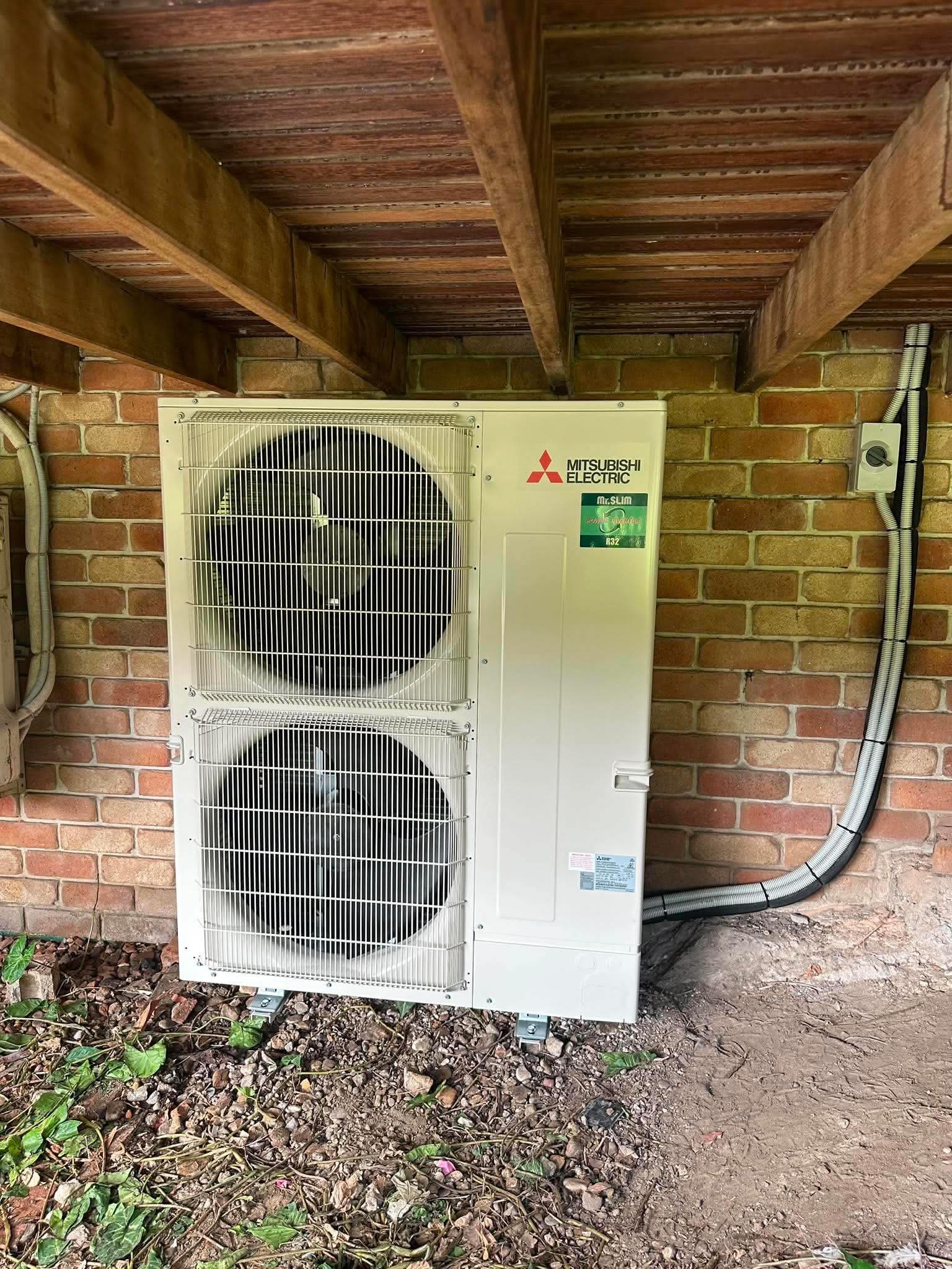 16kw Mitsubishi electric with air touch 2 plus nicely tucked in a service area